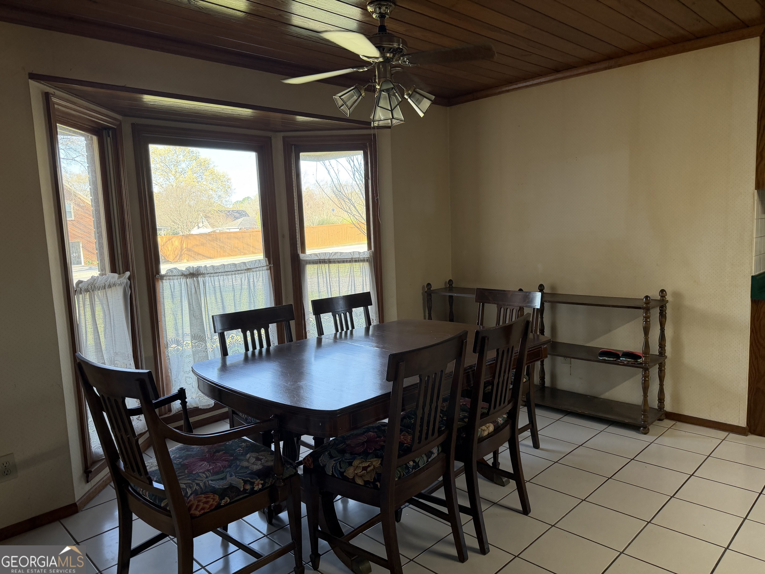 206 Ridge Circle Dublin, GA 31021 - Photo 14 of 40 a view of a dining room with furniture and a window