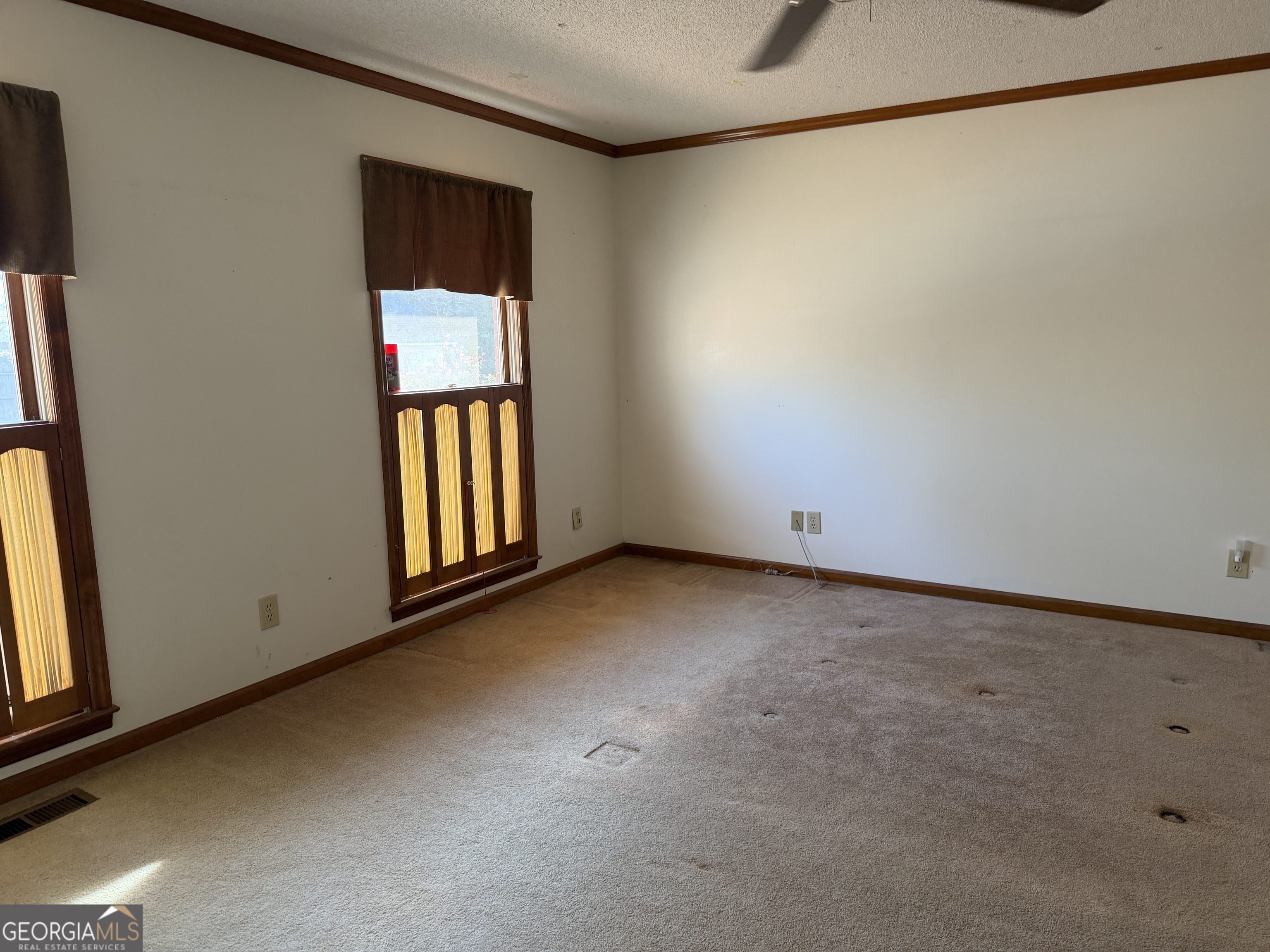 206 Ridge Circle Dublin, GA 31021 - Photo 18 of 40 a view of an empty room with a window