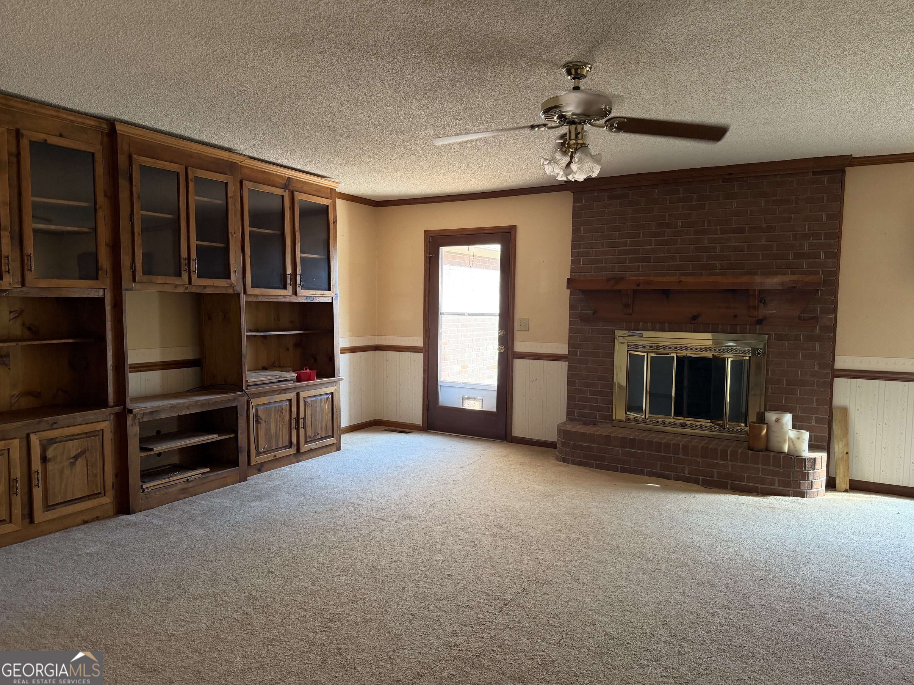 206 Ridge Circle Dublin, GA 31021 - Photo 2 of 40 a view of a livingroom with furniture and a fireplace
