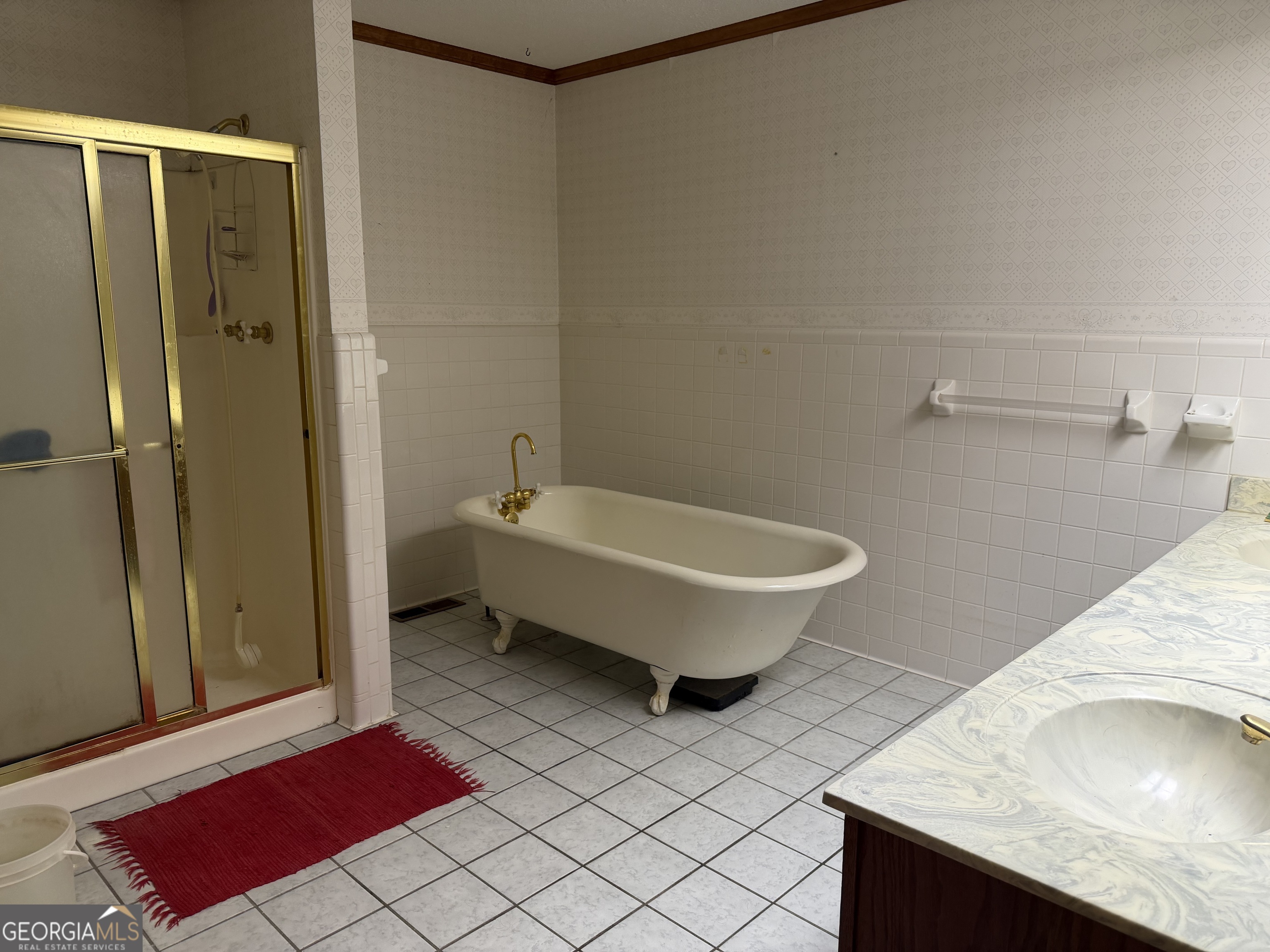 206 Ridge Circle Dublin, GA 31021 - Photo 21 of 40 a bathroom with a sink and a mirror