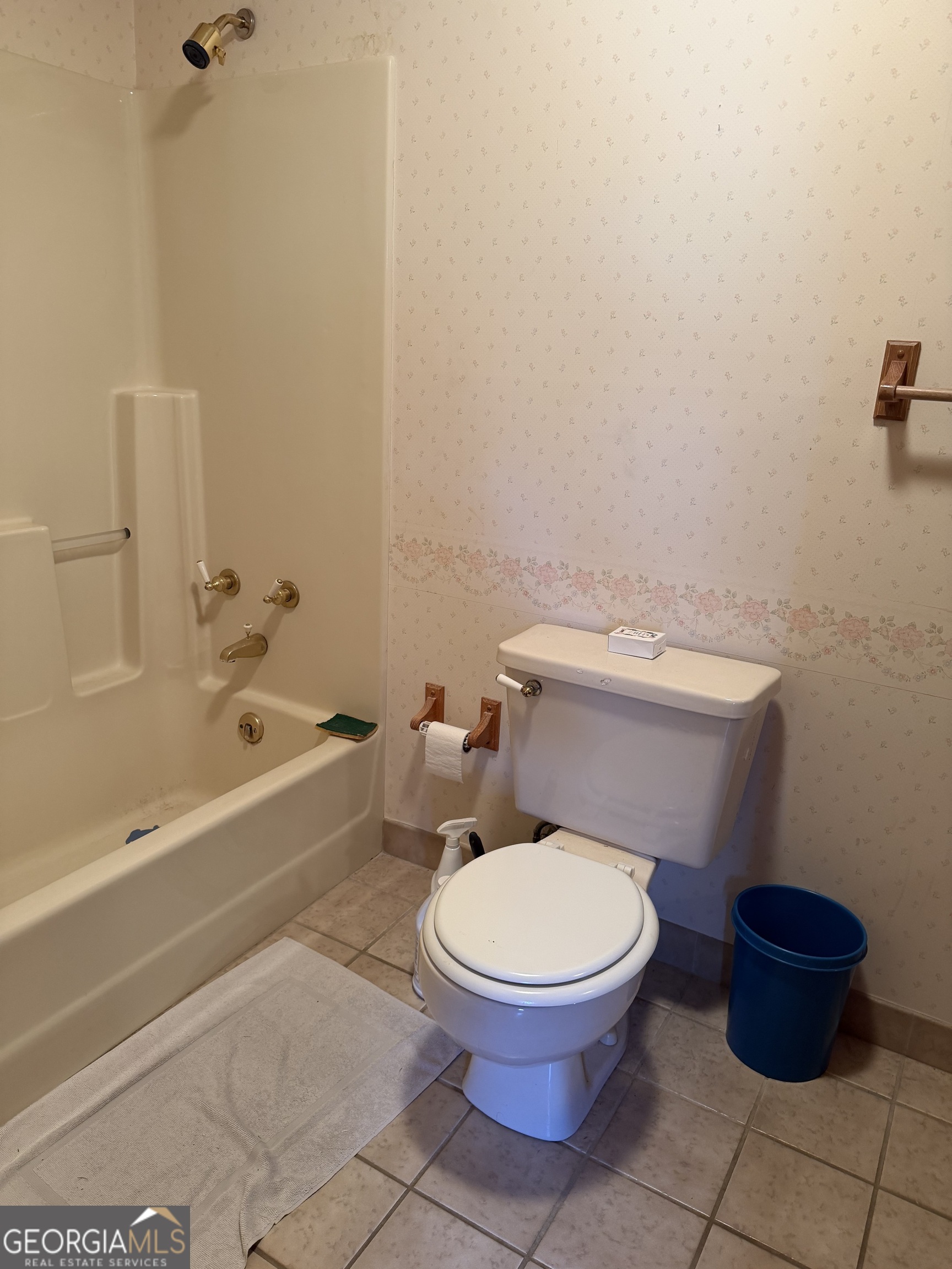 206 Ridge Circle Dublin, GA 31021 - Photo 25 of 40 a white toilet sitting next to a bath tub