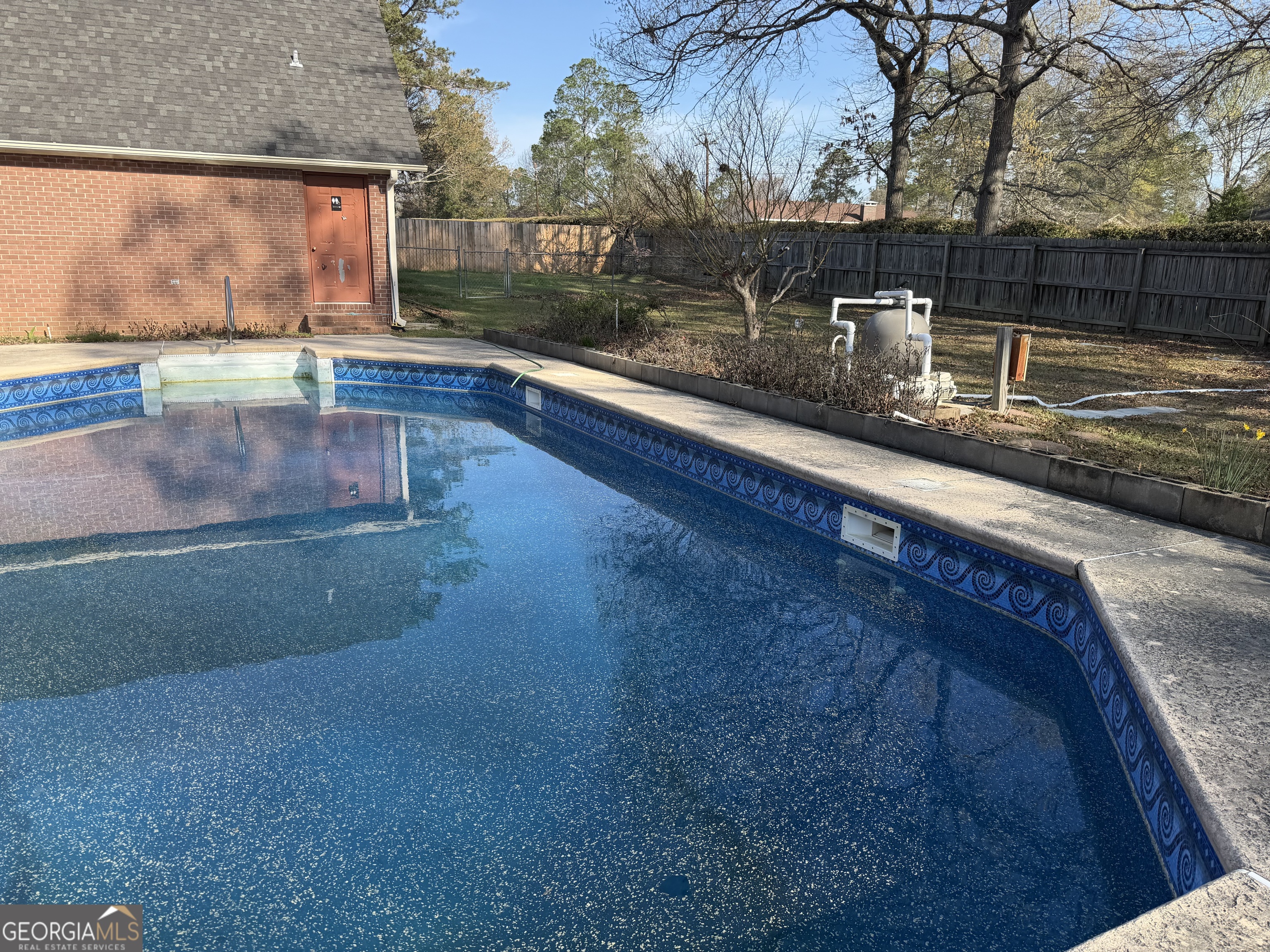 206 Ridge Circle Dublin, GA 31021 - Photo 36 of 40 a view of a pool with a yard