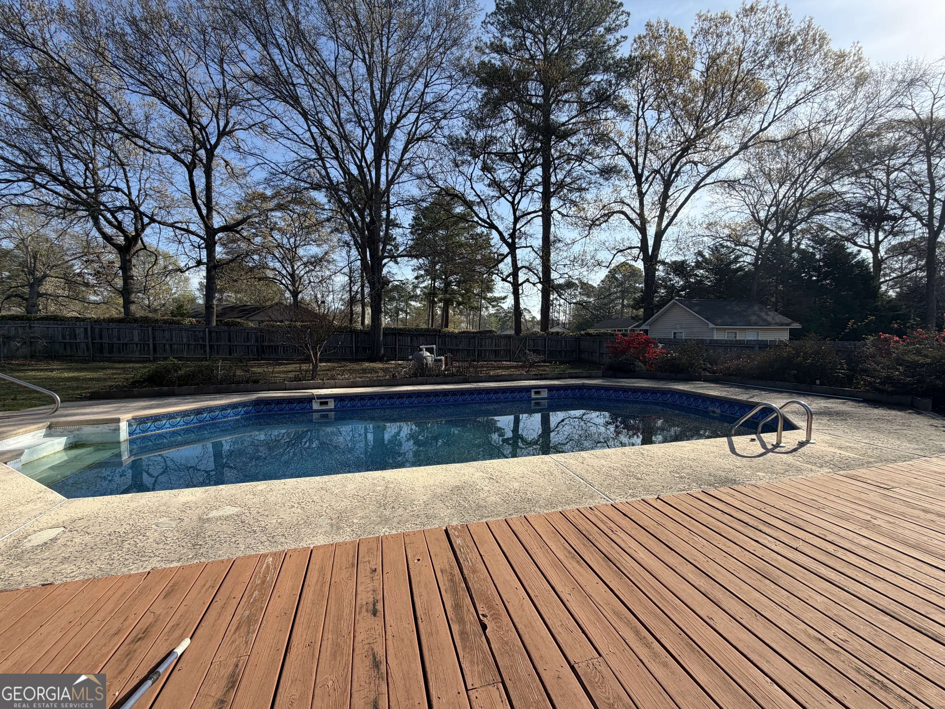 206 Ridge Circle Dublin, GA 31021 - Photo 37 of 40 a view of outdoor space with swimming pool and sitting space
