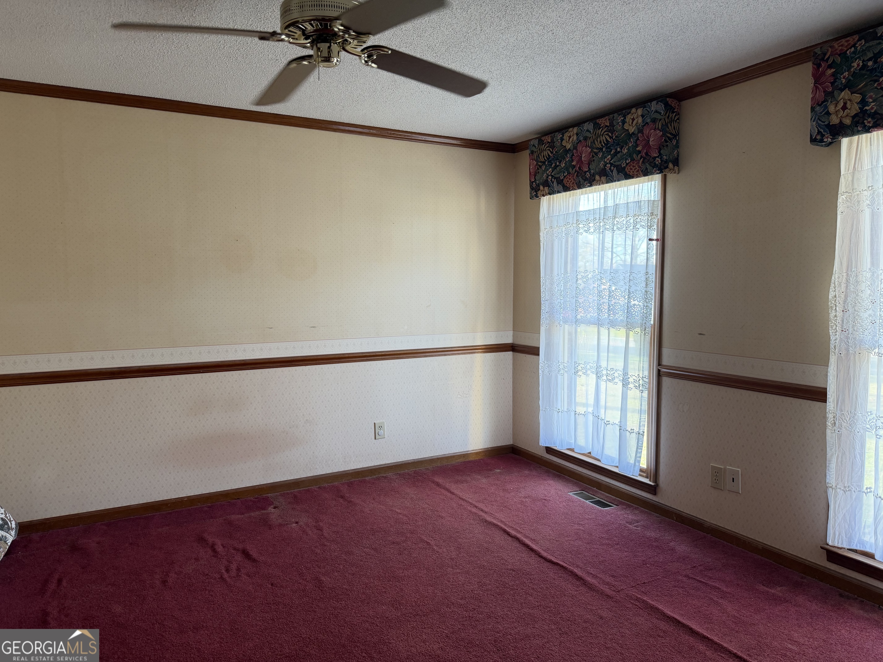 206 Ridge Circle Dublin, GA 31021 - Photo 5 of 40 a view of an empty room with a window