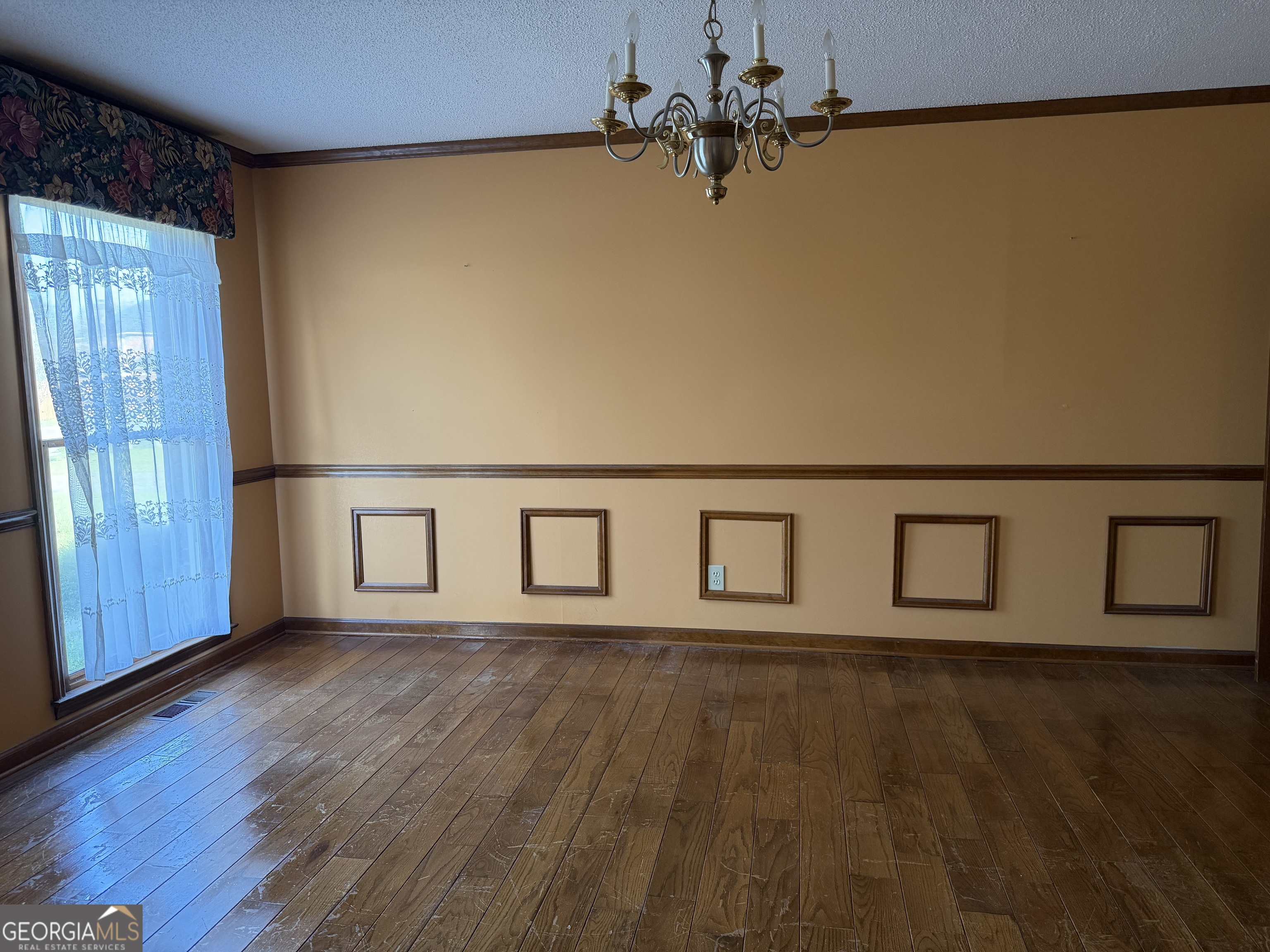 206 Ridge Circle Dublin, GA 31021 - Photo 7 of 40 a view of an empty room with a window