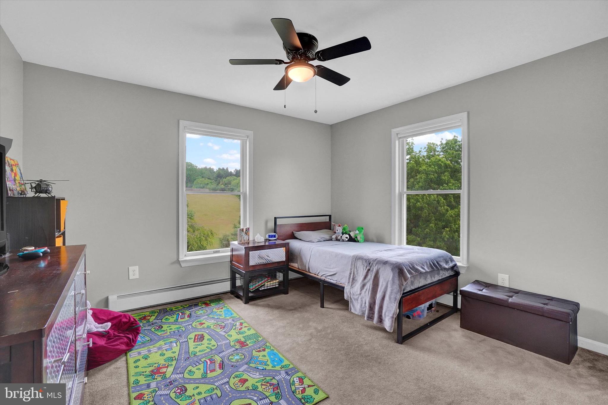 361 Bald Eagle Road Fawn Grove, PA 17321 - Photo 14 of 36 a bed room with a bed and a window