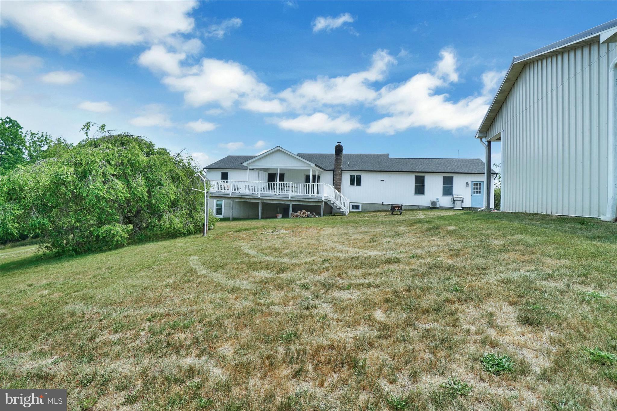 361 Bald Eagle Road Fawn Grove, PA 17321 - Photo 30 of 36 a view of a house with a big yard and a large tree