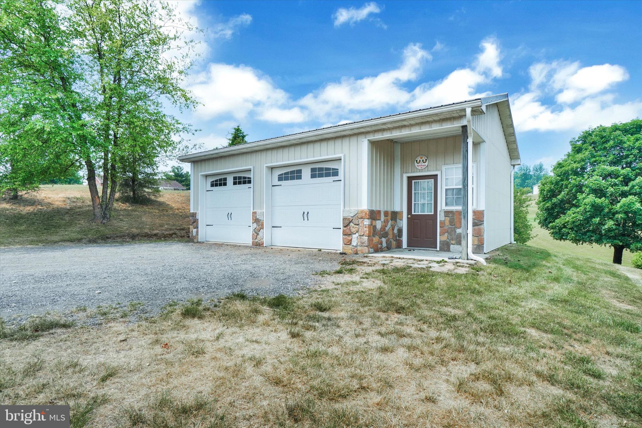 361 Bald Eagle Road Fawn Grove, PA 17321 - Photo 31 of 36 a view of a house with a yard and large tree