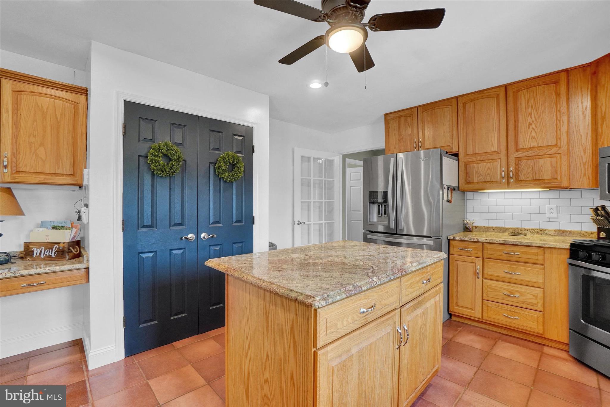361 Bald Eagle Road Fawn Grove, PA 17321 - Photo 6 of 36 a kitchen with a refrigerator and countertop