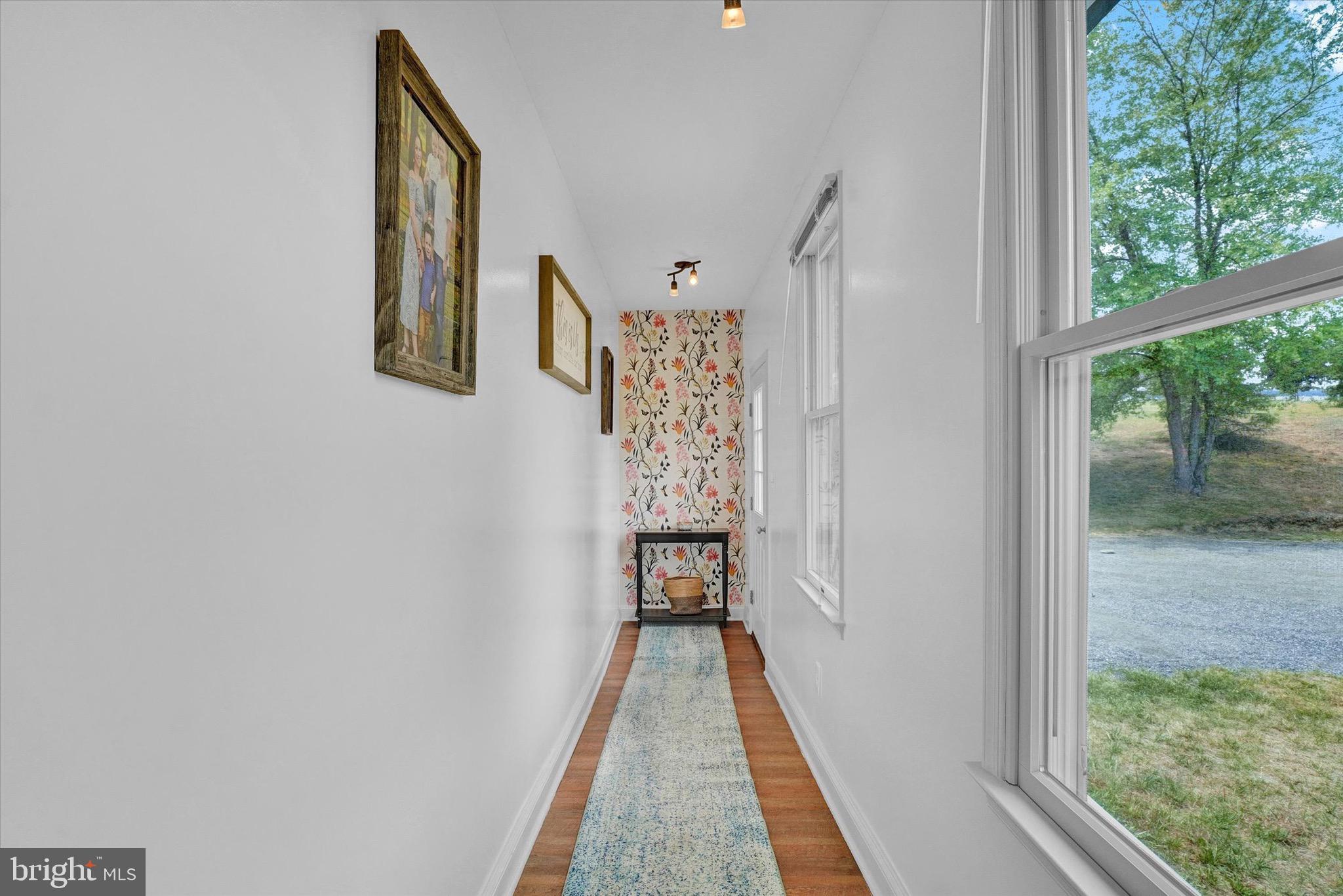 361 Bald Eagle Road Fawn Grove, PA 17321 - Photo 8 of 36 a view of a hallway with wooden floor and a entryway