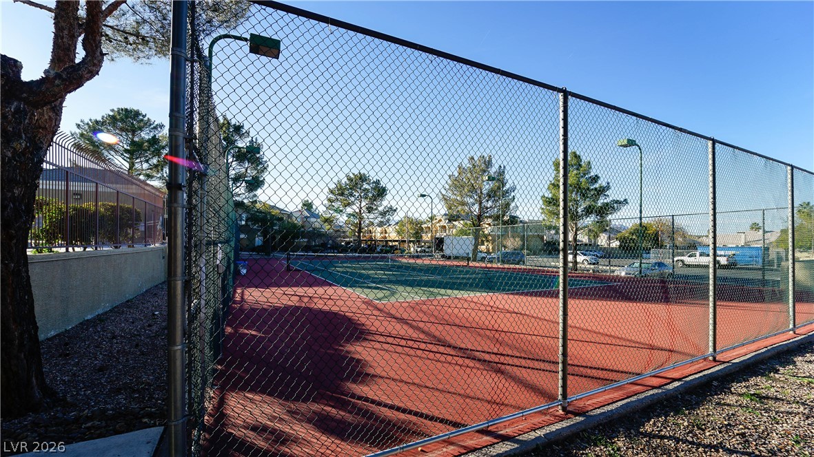 8070 West Russell Road, Unit 1099 Las Vegas, NV 89113 - Photo 30 of 31 Securely fenced tennis courts await your next match.