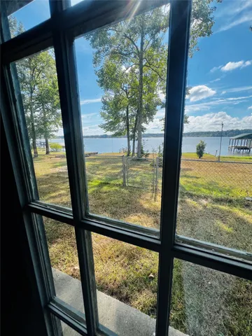 a view of roof deck with two chairs
