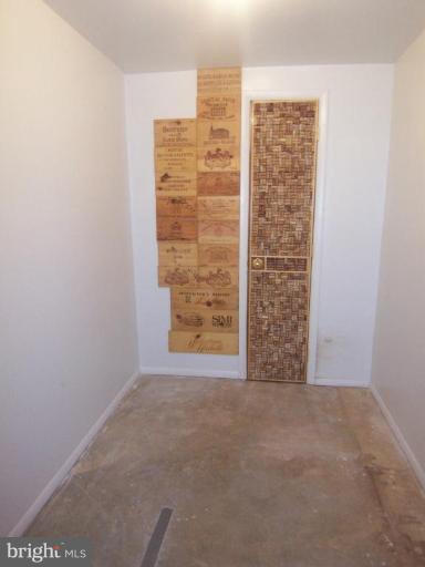 1221 Marclee Road Finksburg, MD 21048 - Photo 15 of 15 a view of an empty room with brick walls