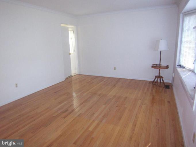 1221 Marclee Road Finksburg, MD 21048 - Photo 10 of 15 a view of a room with wooden floor and a window