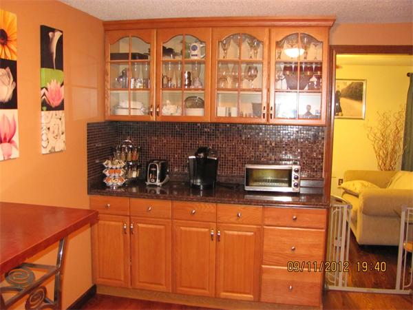 202 Easthampton Road Holyoke, MA 01040 - Photo 4 of 12 a kitchen with stainless steel appliances a stove and a microwave