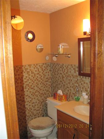 202 Easthampton Road Holyoke, MA 01040 - Photo 5 of 12 a bathroom with a sink a toilet and shower