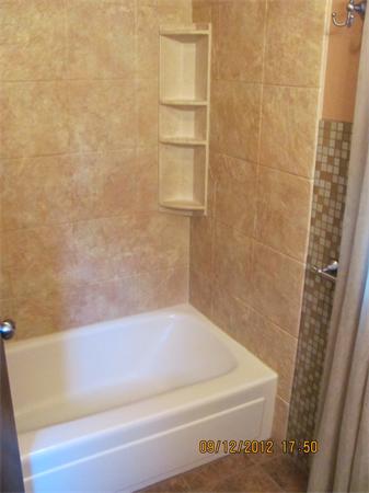 202 Easthampton Road Holyoke, MA 01040 - Photo 6 of 12 a bathroom with a bathtub