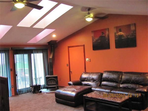 202 Easthampton Road Holyoke, MA 01040 - Photo 10 of 12 a living room with furniture and a window