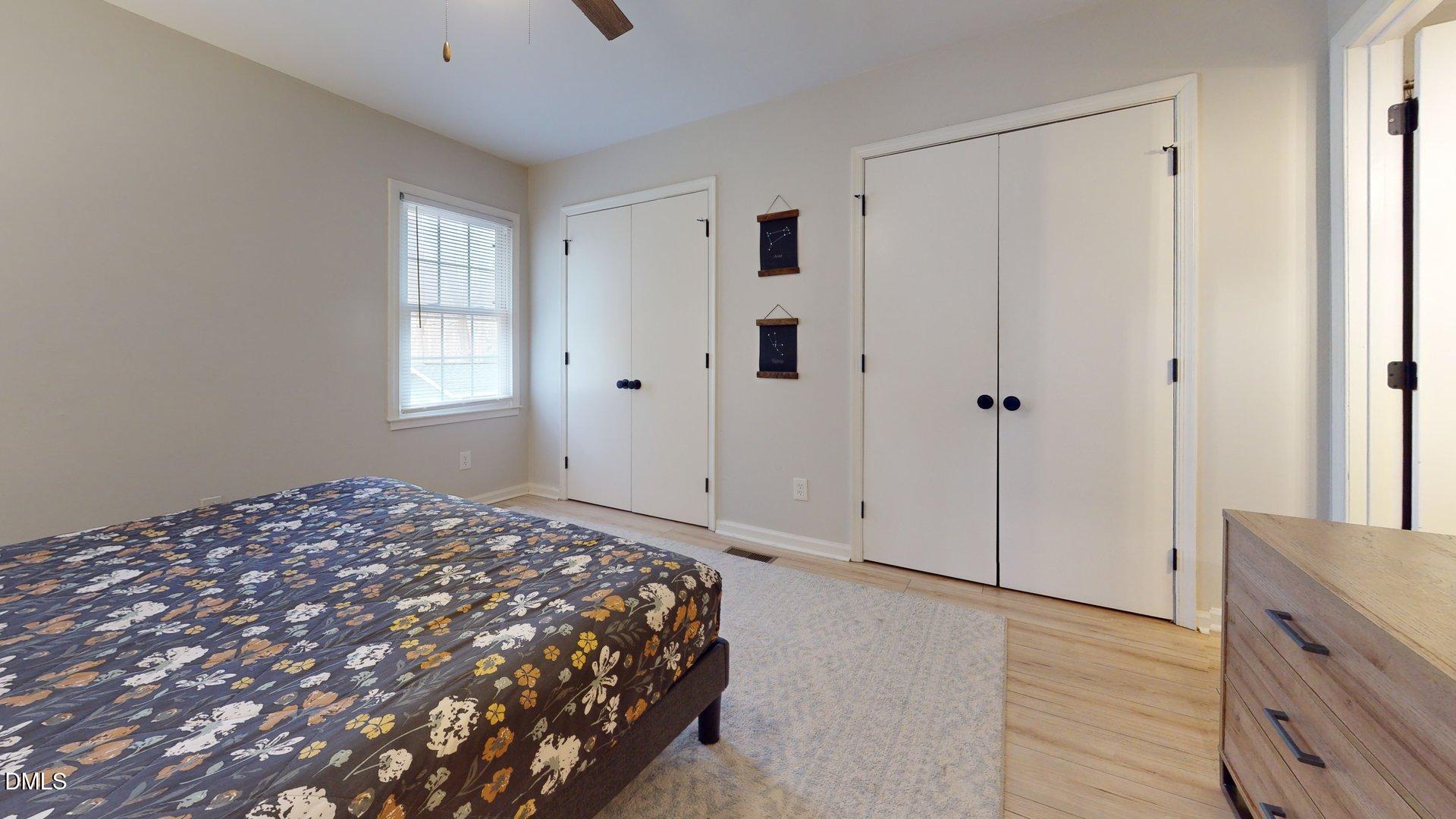 7720 Foxwood Drive Raleigh, NC 27615 - Photo 26 of 46 a bedroom with a bed and a window