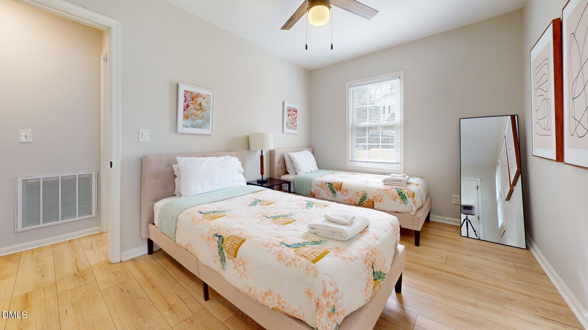 7720 Foxwood Drive Raleigh, NC 27615 - Photo 27 of 46 a bed room with bed and a window