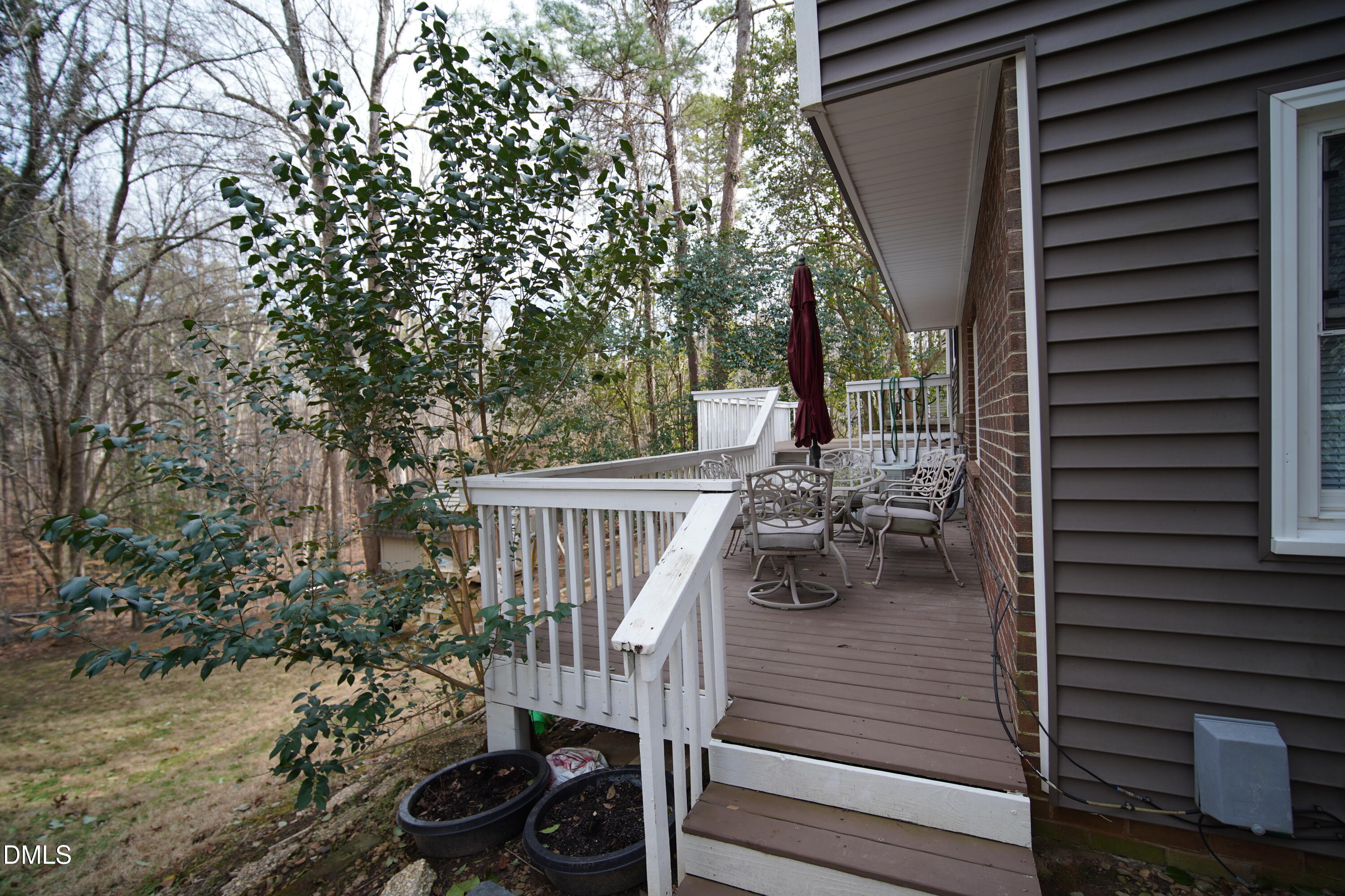 7720 Foxwood Drive Raleigh, NC 27615 - Photo 35 of 46 a view of balcony and deck