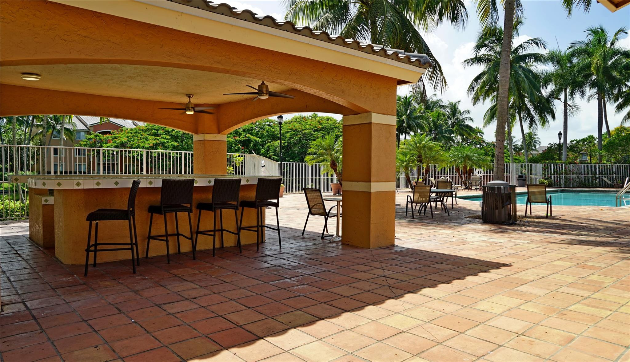 3854 Lyons Road, Unit 3075 Coconut Creek, FL 33073 - Photo 21 of 29 Pool area & BBQ