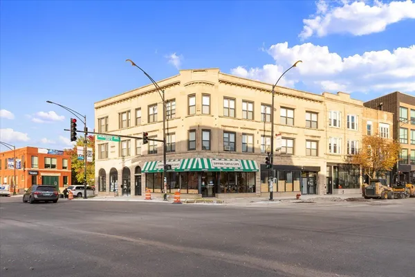 a view of a building and a street