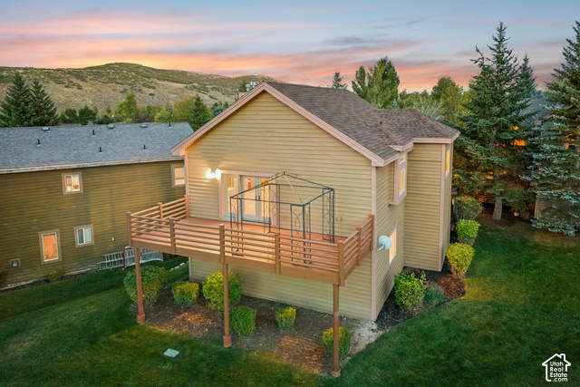 7396 Brook Hollow Loop Road Park City, UT 84098 - Photo 56 of 60 Expansive wood deck with horizontal railing, offering direct access to the interior