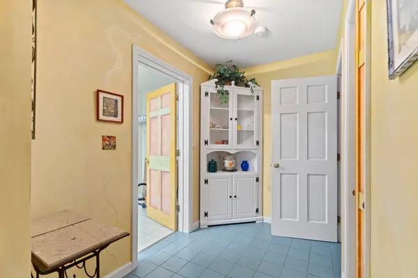 a bathroom with a sink mirror toilet and shower