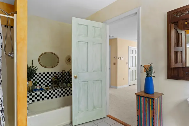 an aerial view of a house with yard and outdoor seating