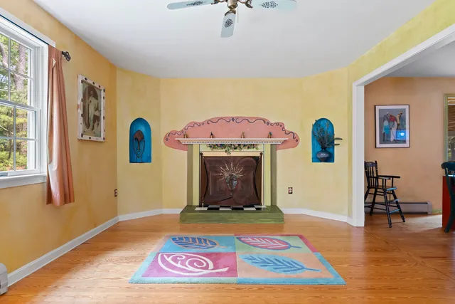 a living room with a rug