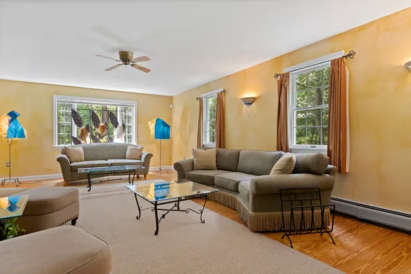 a living room with furniture and a window
