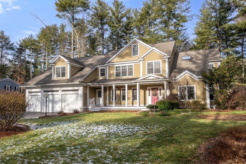 353 Dutton Road Sudbury, MA 01776 - Photo 2 of 42 a front view of a house with a garden