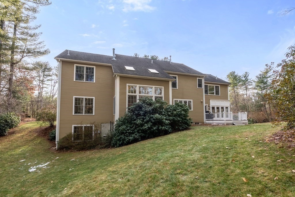 353 Dutton Road Sudbury, MA 01776 - Photo 41 of 42 a house view with a garden space