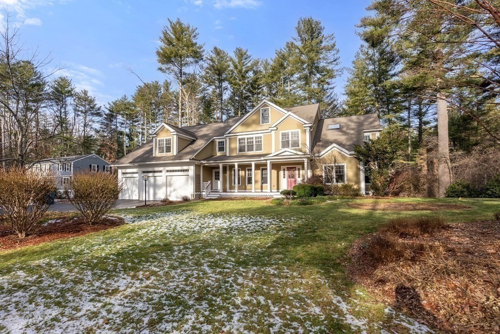 353 Dutton Road Sudbury, MA 01776 - Photo 42 of 42 a front view of a house with a garden