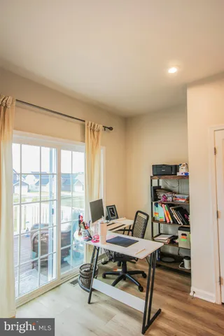 a view of a workspace with furniture