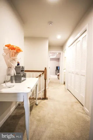 a view of a kitchen with furniture and a kitchen
