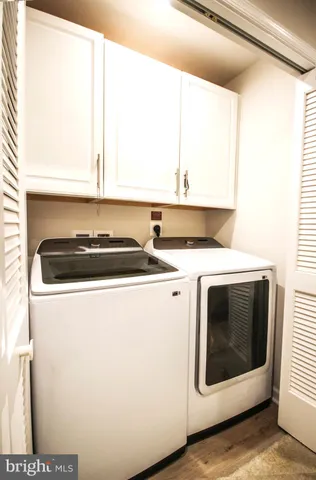 a kitchen with a sink and a microwave