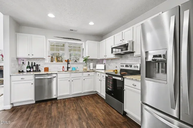 $425,000 | 5002 Gaithers Pointe Drive, Durham, NC 27713