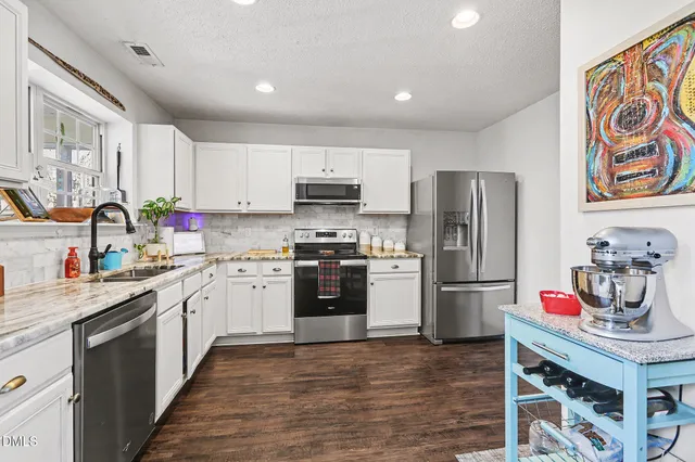 $425,000 | 5002 Gaithers Pointe Drive, Durham, NC 27713