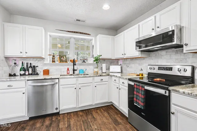 $425,000 | 5002 Gaithers Pointe Drive, Durham, NC 27713