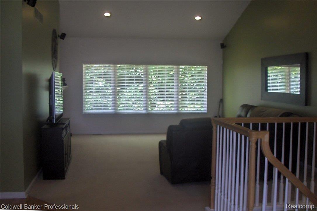 48367 Rockefeller Drive, Unit 11 Canton, MI 48188 - Photo 2 of 22 Entry to Vaulted Great Room