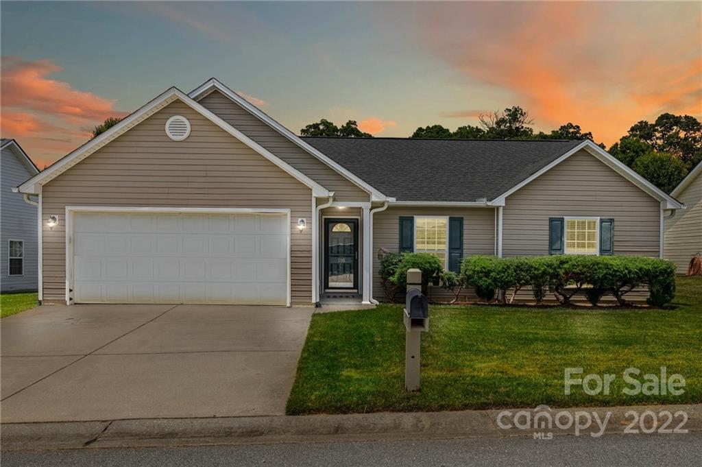 198 Lumber River Road Fletcher, NC 28732 - Photo 1 of 39 a front view of house with yard and green space
