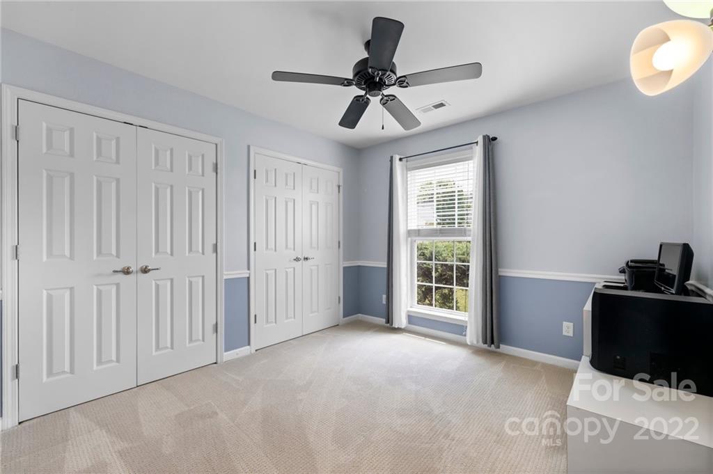 198 Lumber River Road Fletcher, NC 28732 - Photo 23 of 39 a view of a livingroom with a ceiling fan and window