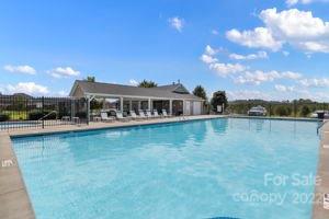 198 Lumber River Road Fletcher, NC 28732 - Photo 37 of 39 a view of a house with pool and a yard
