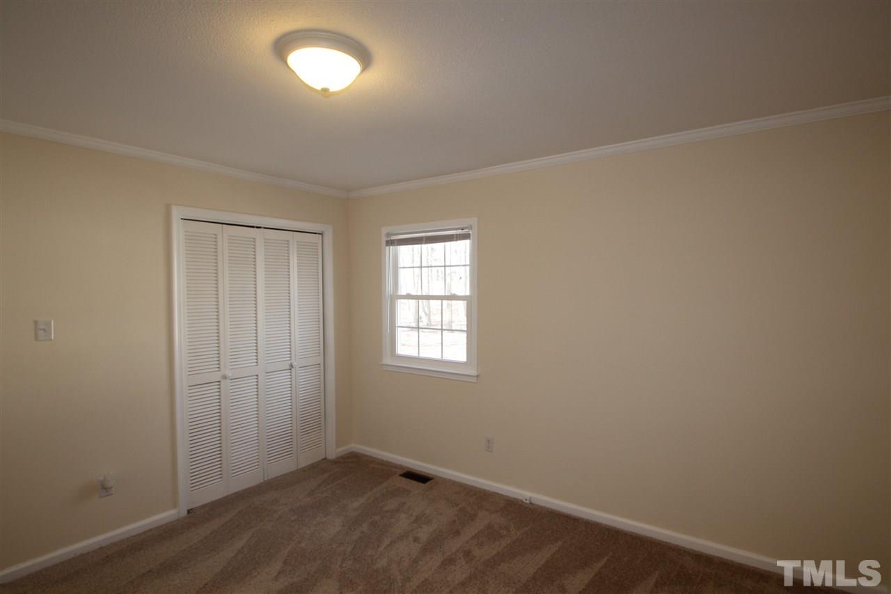 907 Torredge Road Durham, NC 27712 - Photo 11 of 19 an empty room with windows