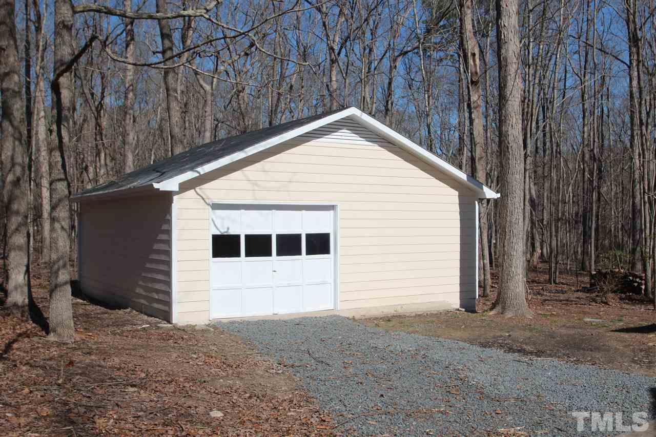 907 Torredge Road Durham, NC 27712 - Photo 16 of 19 a view of a house with a backyard