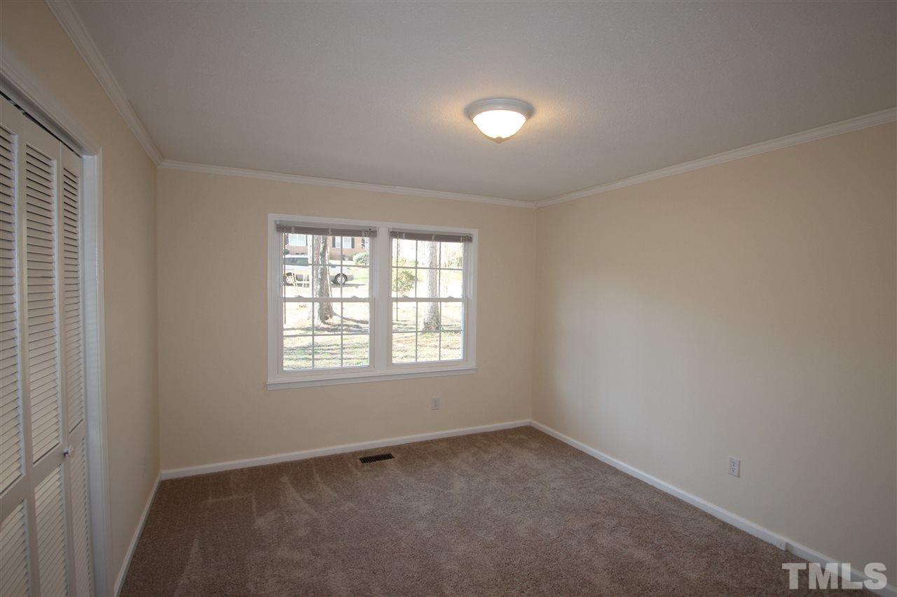 907 Torredge Road Durham, NC 27712 - Photo 8 of 19 an empty room with a window
