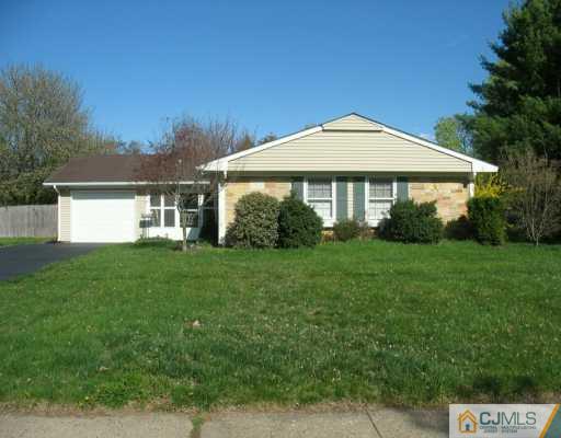 13 Sweetbriar Road Somerset, NJ 08873 - Photo 1 of 8 a view of a house with backyard and garden
