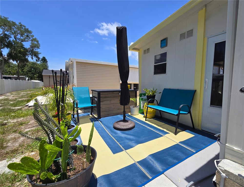 5619 Bayshore Road, Unit 435 Palmetto, FL 34221 - Photo 35 of 56 a view of a terrace with furniture